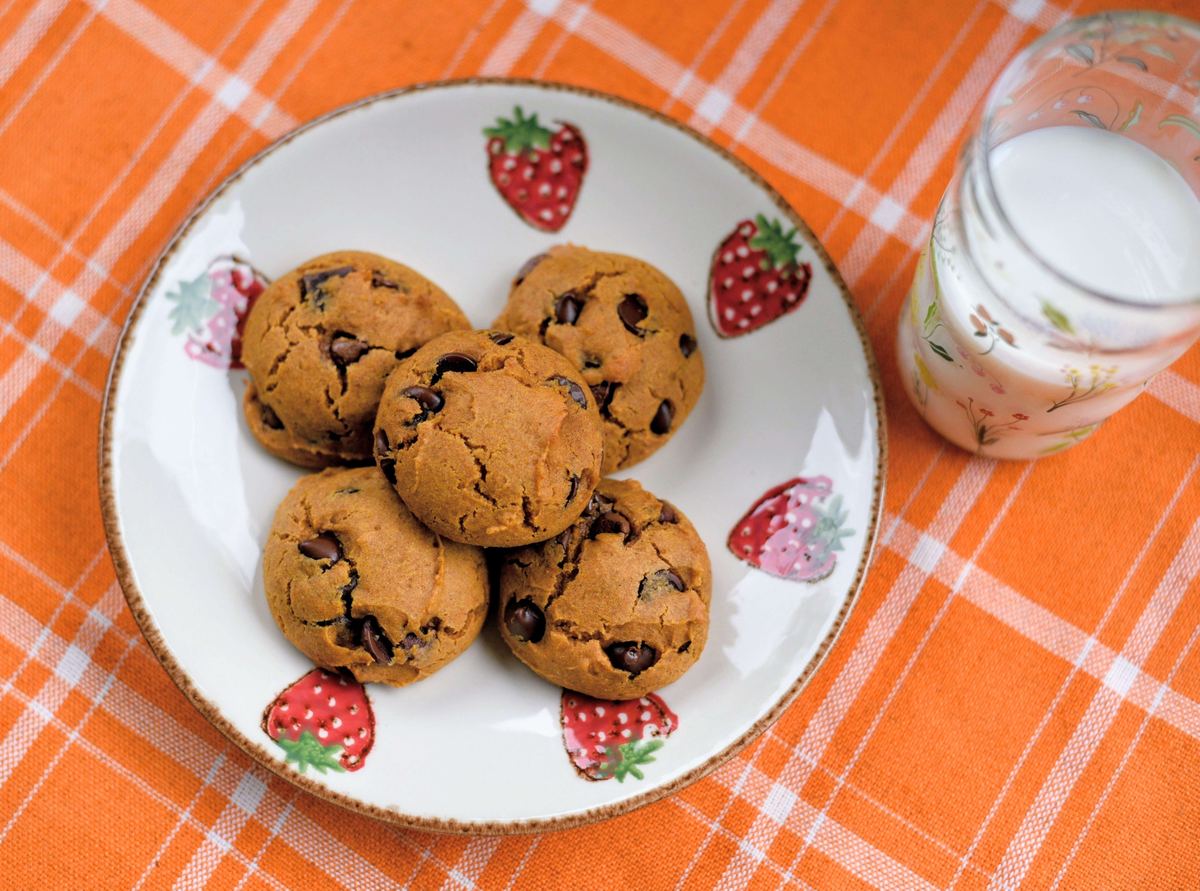 Pumpkin chocolate chip cookies and a glass of milk